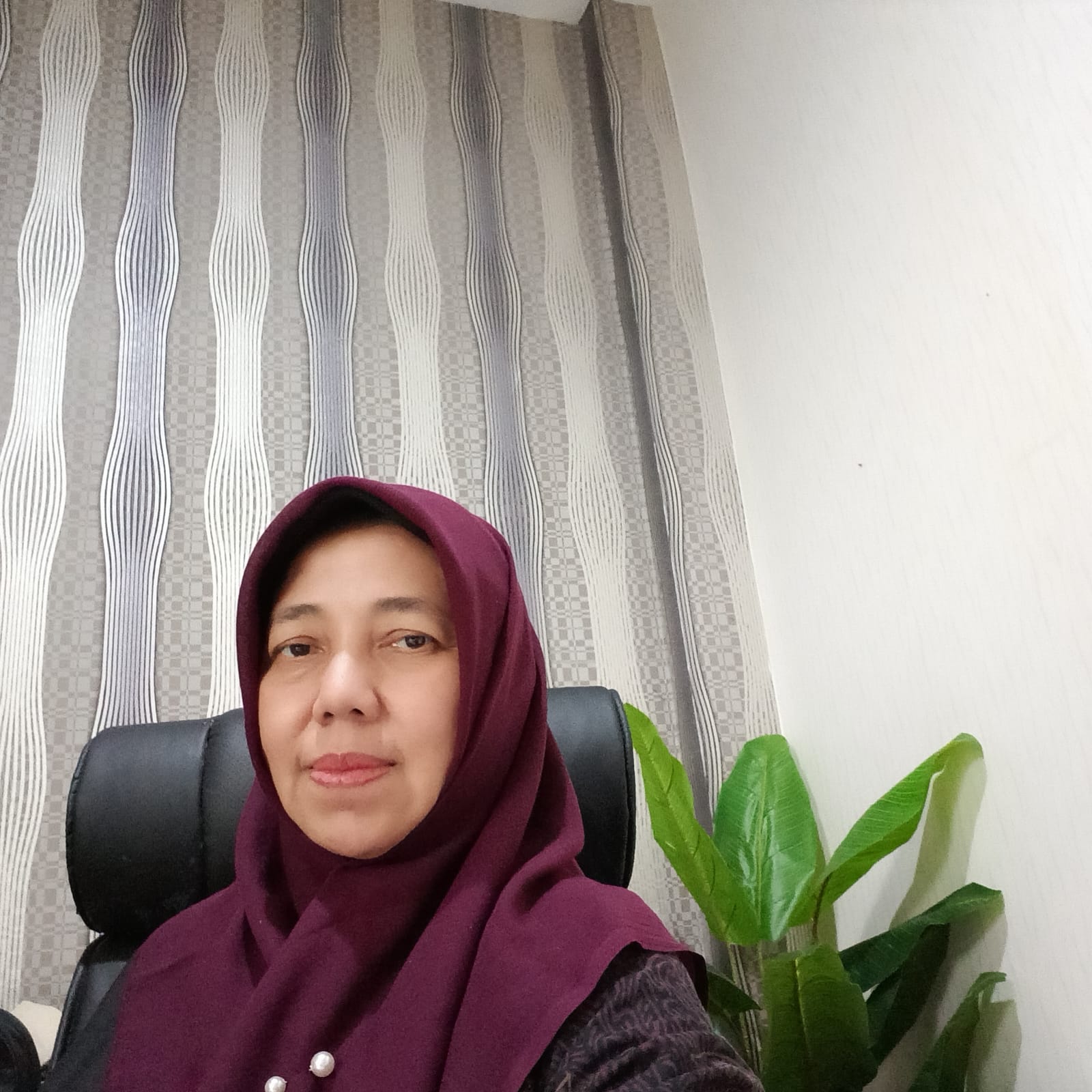 Dr. Herfina, M.Pd., M.Kom.